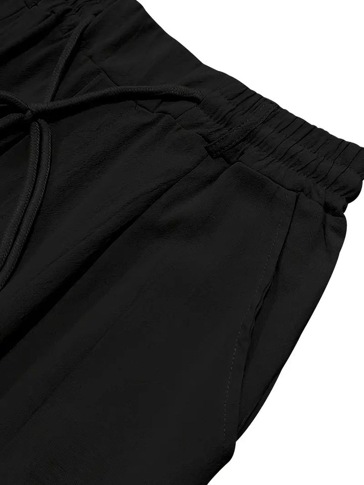 NICHOLS | PANTALONES LARGOS DE LINO CON CORDÓN