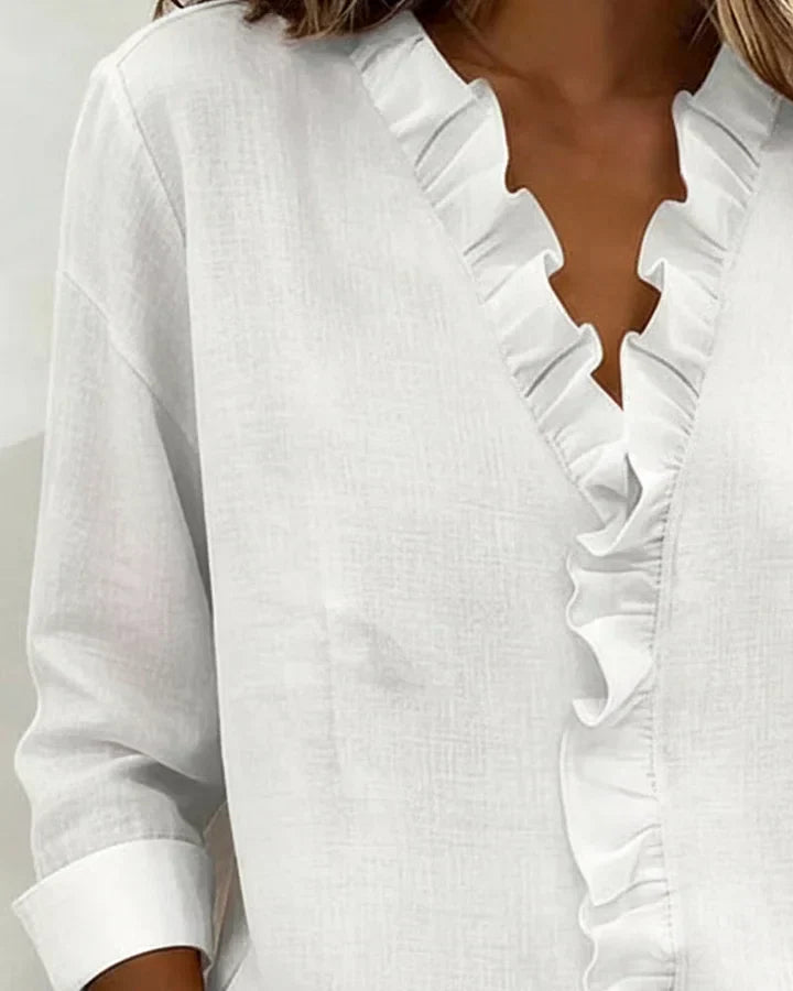 Indie · Blusa con volantes y cuello en V