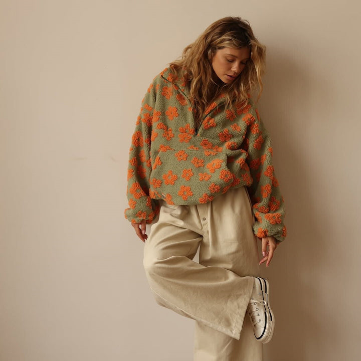 Daisy - Jersey oversize con estampado floral
