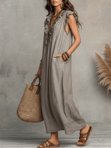 Vestido maxi bohemio sin mangas con escote en V y caída fluida