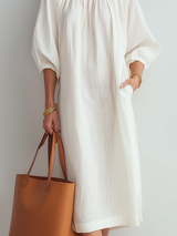 Vestido midi crema de corte relajado