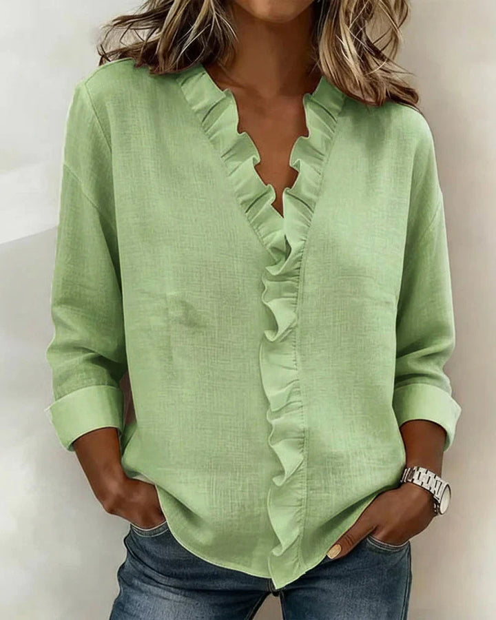 Indie · Blusa con volantes y cuello en V