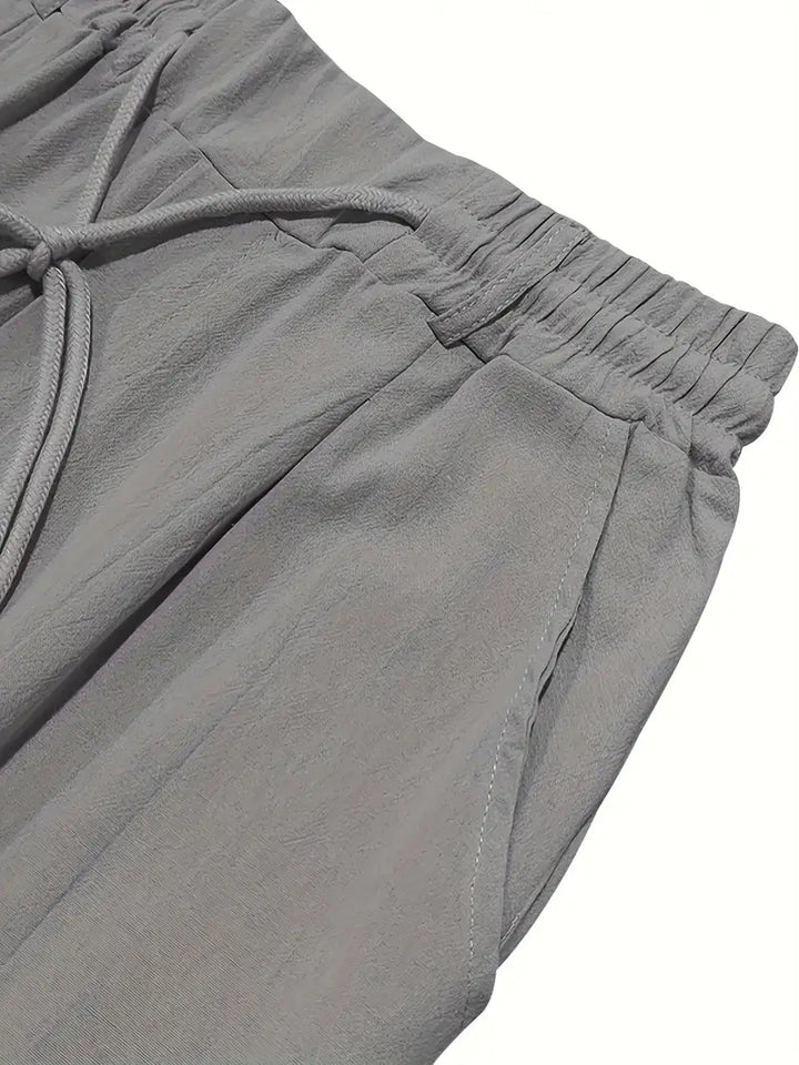 NICHOLS | PANTALONES LARGOS DE LINO CON CORDÓN