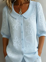 Camille | Camisa con cuello retro, con flores.