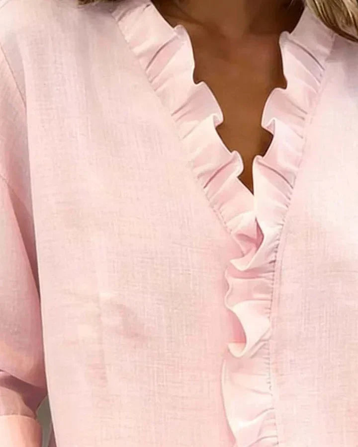 Indie · Blusa con volantes y cuello en V