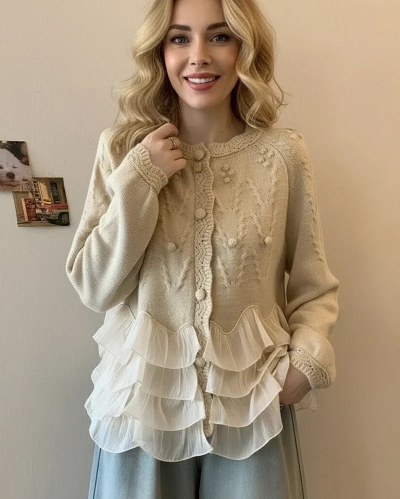 Nina – Cárdigan elegante con volantes