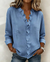 Indie · Blusa con volantes y cuello en V