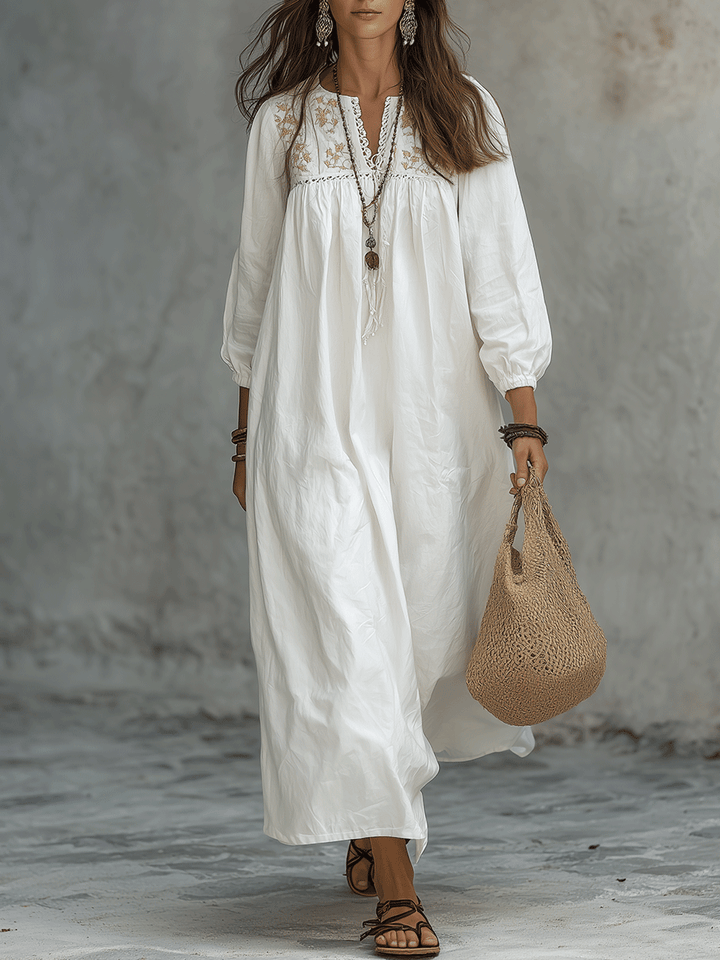 Vestido maxi blanco bohemio con bordado de flores y mangas globo