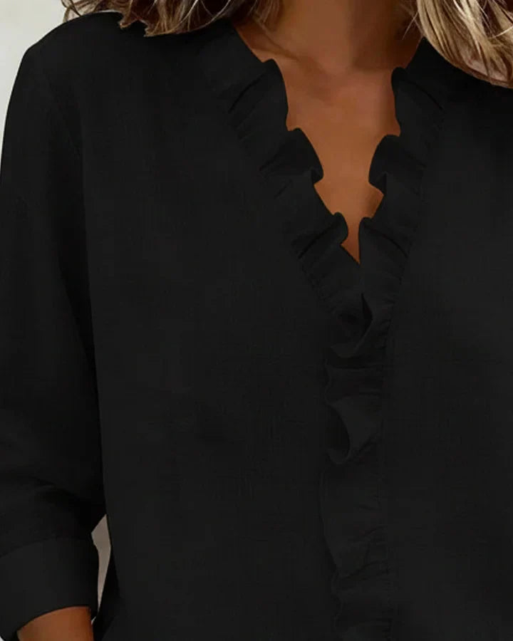 Indie · Blusa con volantes y cuello en V