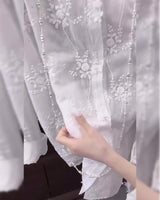 Emilia – Blusa bordada elegante