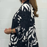 Petra - Blusa con mangas acampanadas y volantes