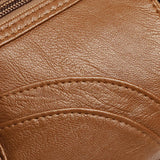 Clara - Bolso bandolera moderno con múltiples cremalleras y correa ajustable