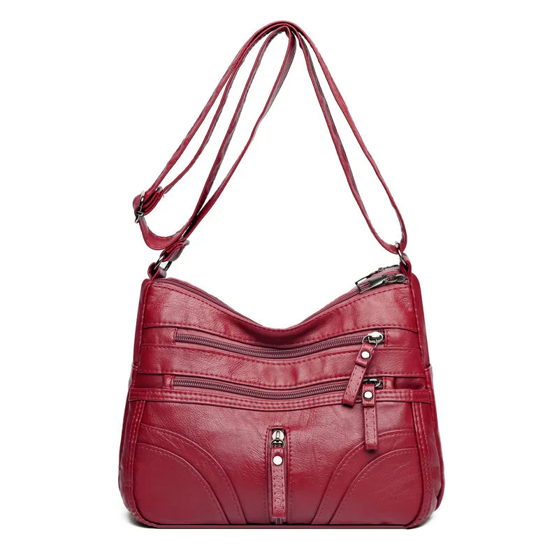 Clara - Bolso bandolera moderno con múltiples cremalleras y correa ajustable
