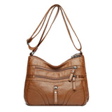 Clara - Bolso bandolera moderno con múltiples cremalleras y correa ajustable