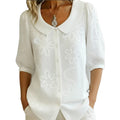Camille | Camisa con cuello retro, con flores.