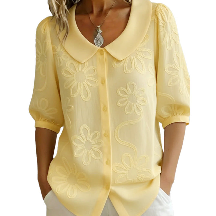 Camille | Camisa con cuello retro, con flores.